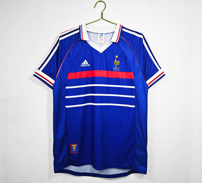 big_9_64edda10-2690-4bb4-9b67-33e4aaa33bff PRIMERA EQUIPACIÓN RETRO FRANCIA 1998 - Imagen 1